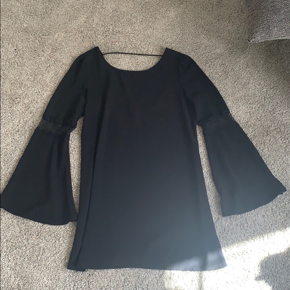 Black dress with lace peep and bellbottom sleeves